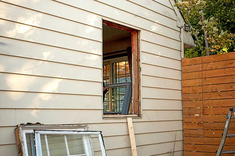 A full-frame window installation in progress.