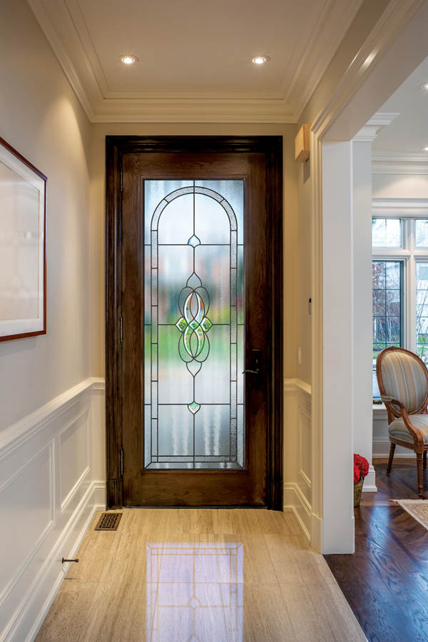 A fibreglass entry door with Everton glass inserts on a Fibreglass door slab.