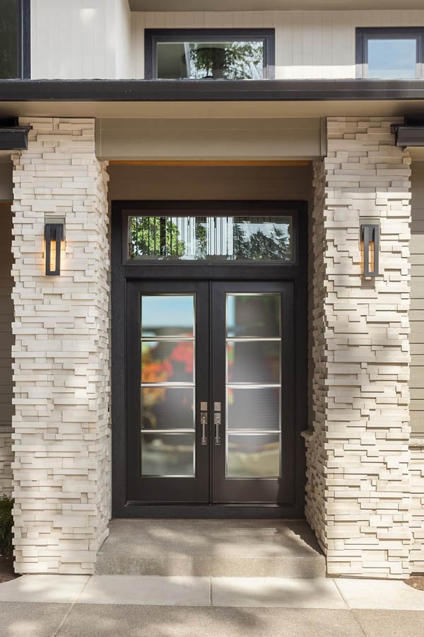 An entry door with Quattro glass inserts on a Flat door slab.