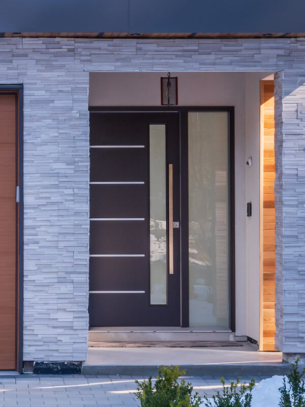 Teal replacement front door with double sidelites containing decorative glass